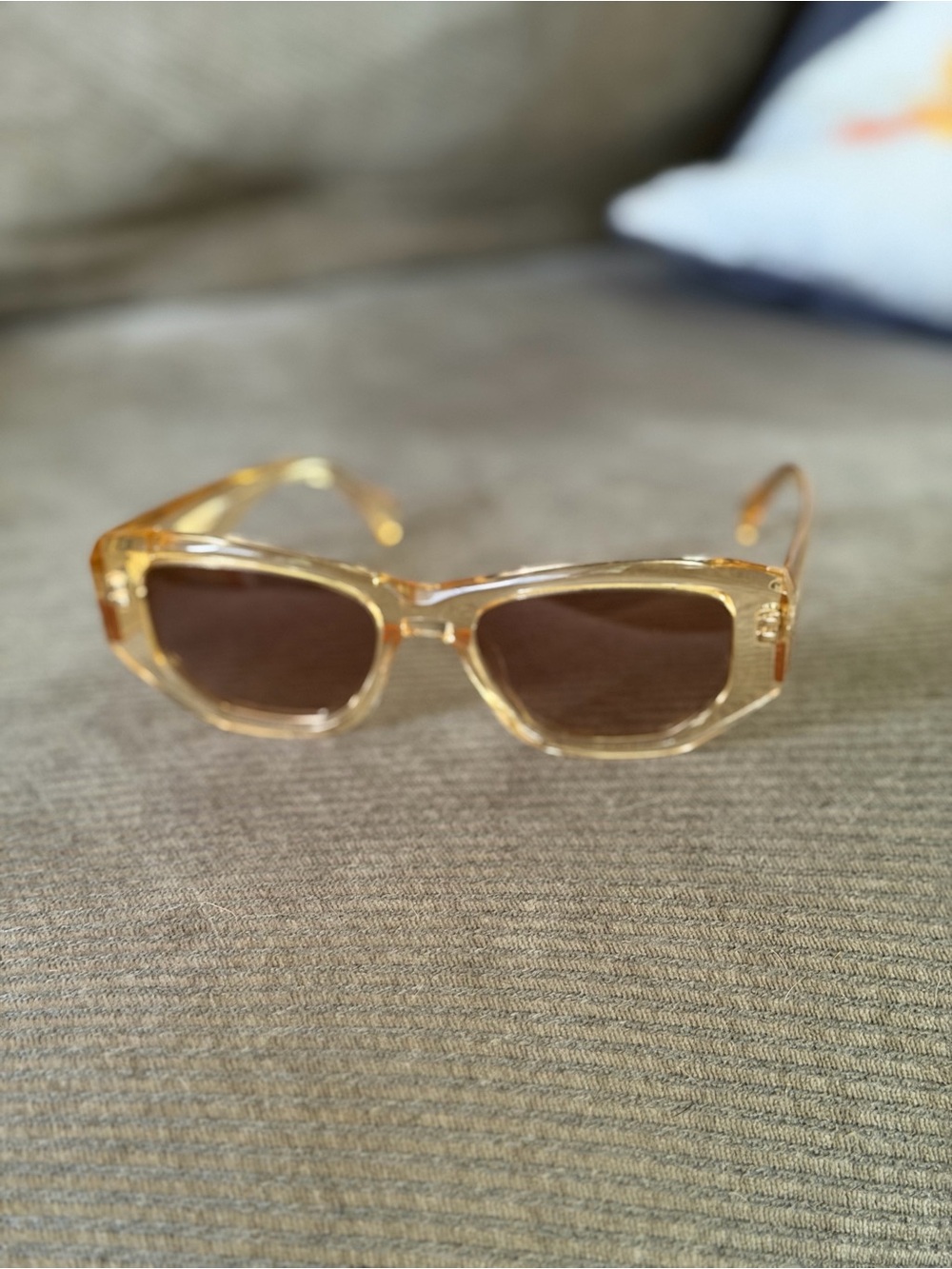 RAEN Translucent Amber Frame Sunglasses with Brown Lenses